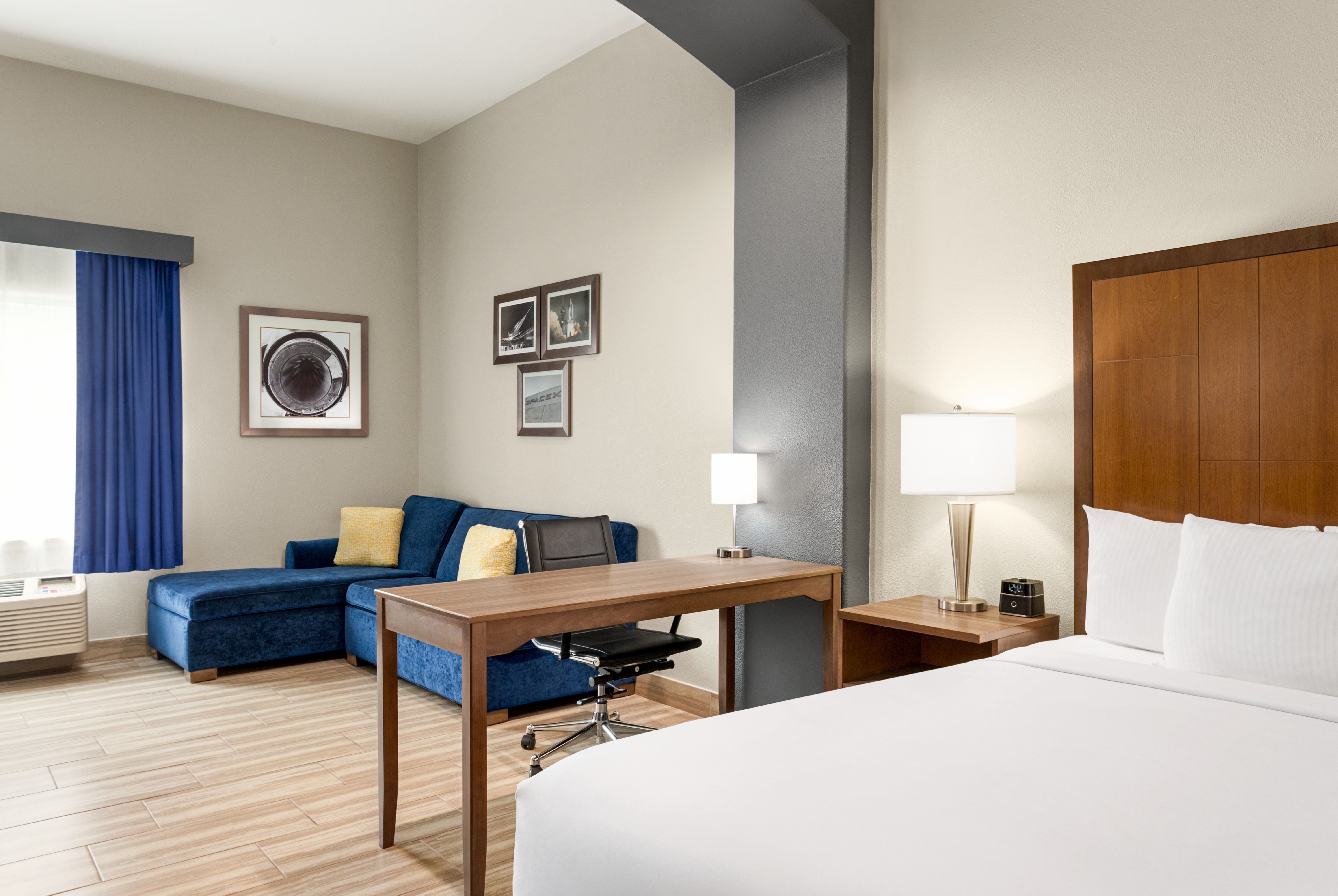 King bed guest room at the La Quinta Inn & Suites by Wyndham Brownsville North in Brownsville, Texas